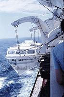 Arcadia's Motor Lifeboat swung out on davits 1959